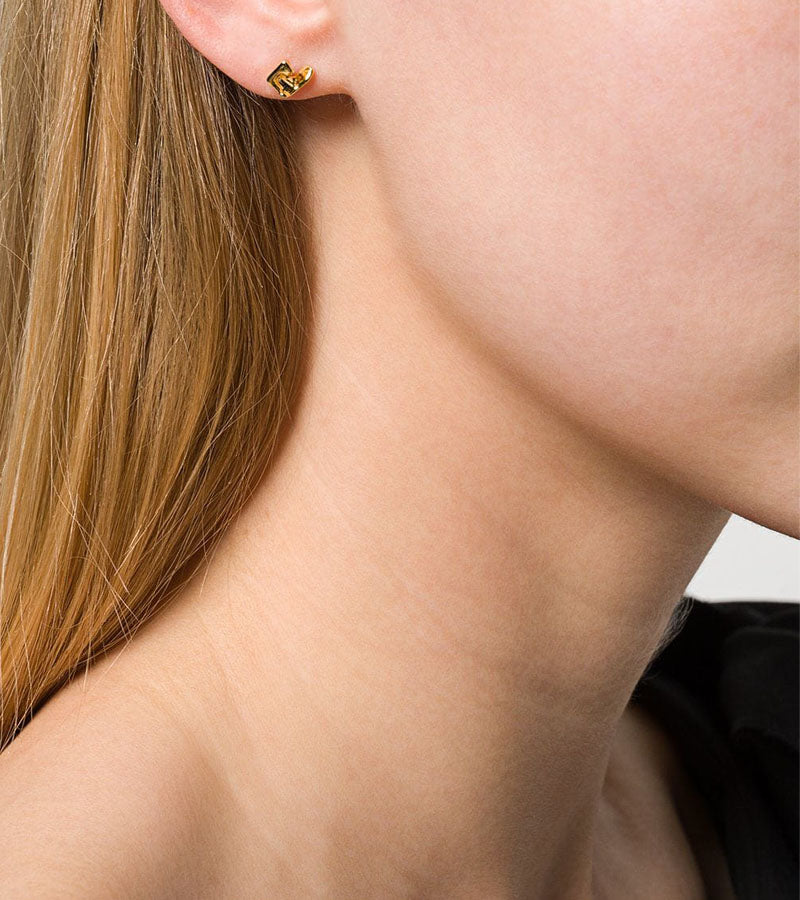 Coup de Coeur Gold mini vortex stud earrings close up