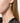 Coup de Coeur Gold vortex disc hoop earrings