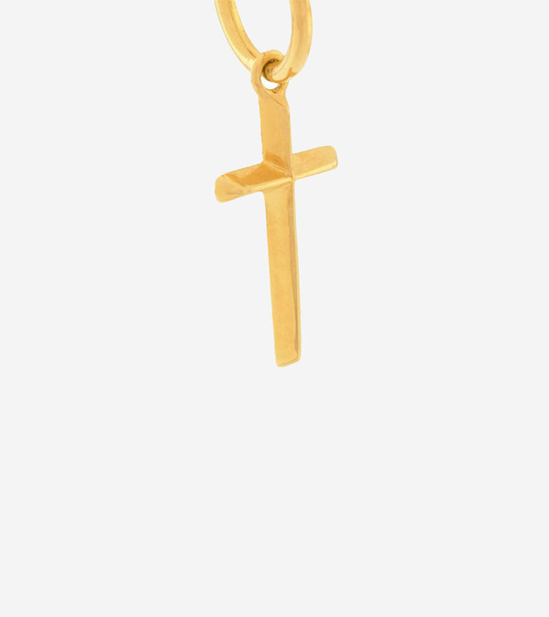 Coup de Coeur Gold cross hoop earring detail